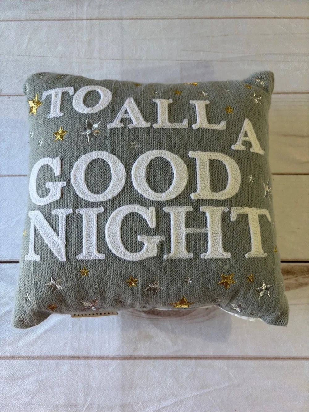Pottery Barn Gray Holiday Pillow with White Lettering and Metallic Stars